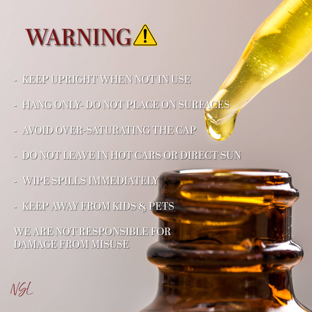 Warnings when using the hanging diffuser, oil being dripped into a bottle in the background.