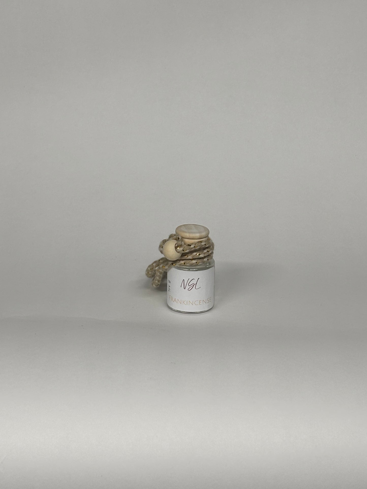 frankincense hanging diffuser on a white background