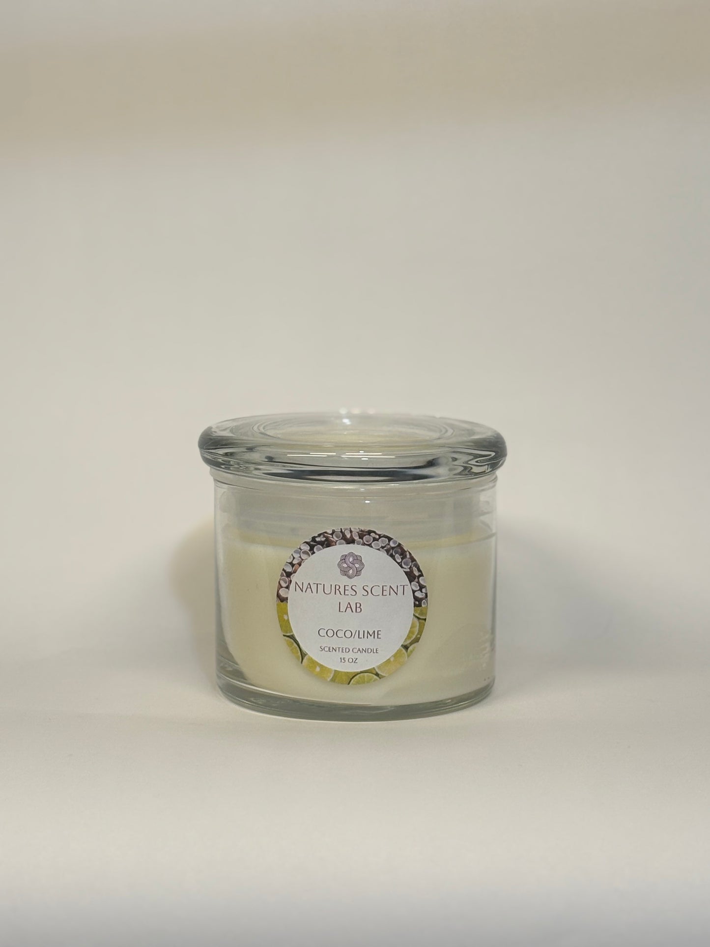 15oz coco/lime candle on a white background