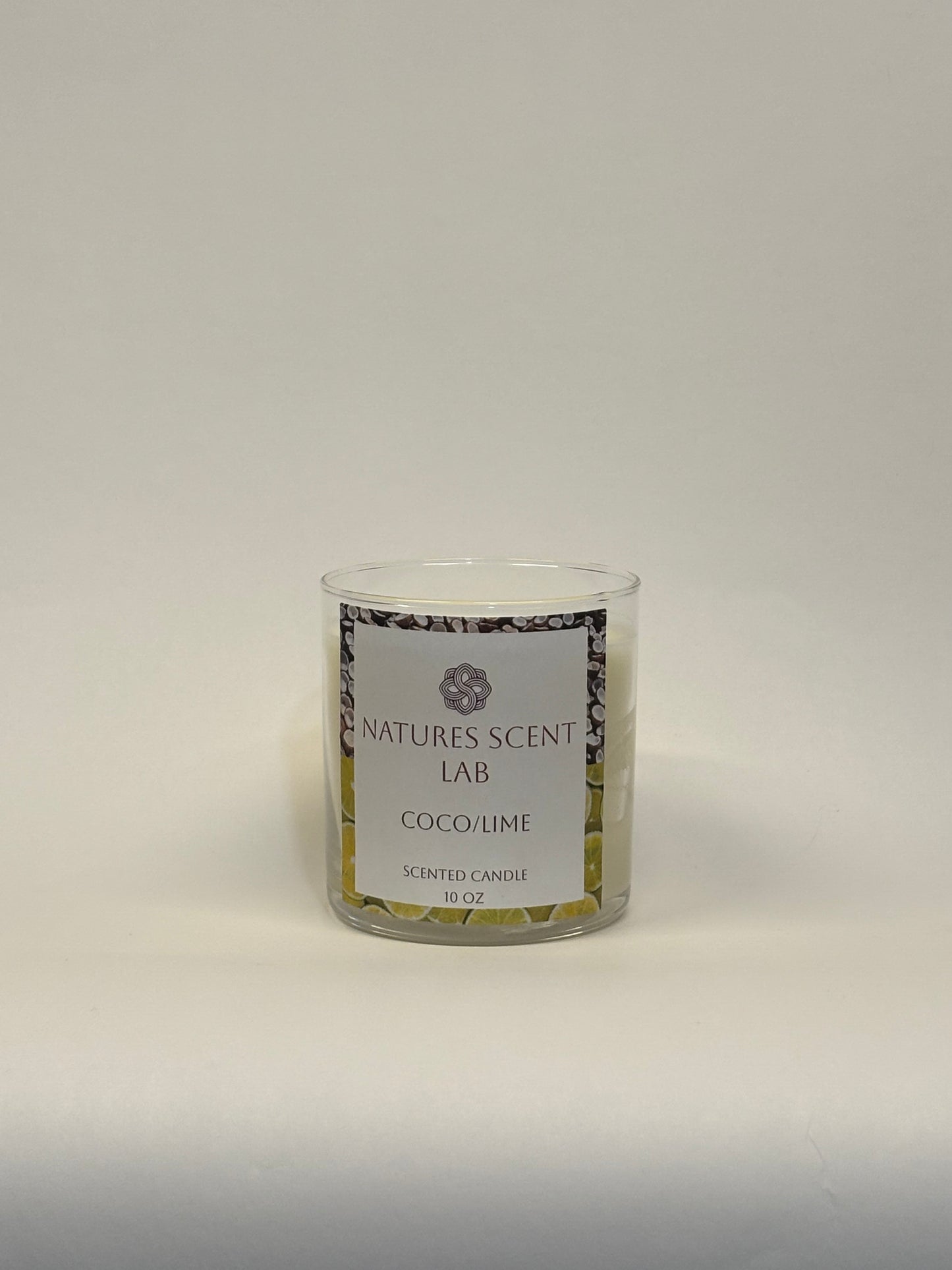 10oz coco/lime candle on a white background
