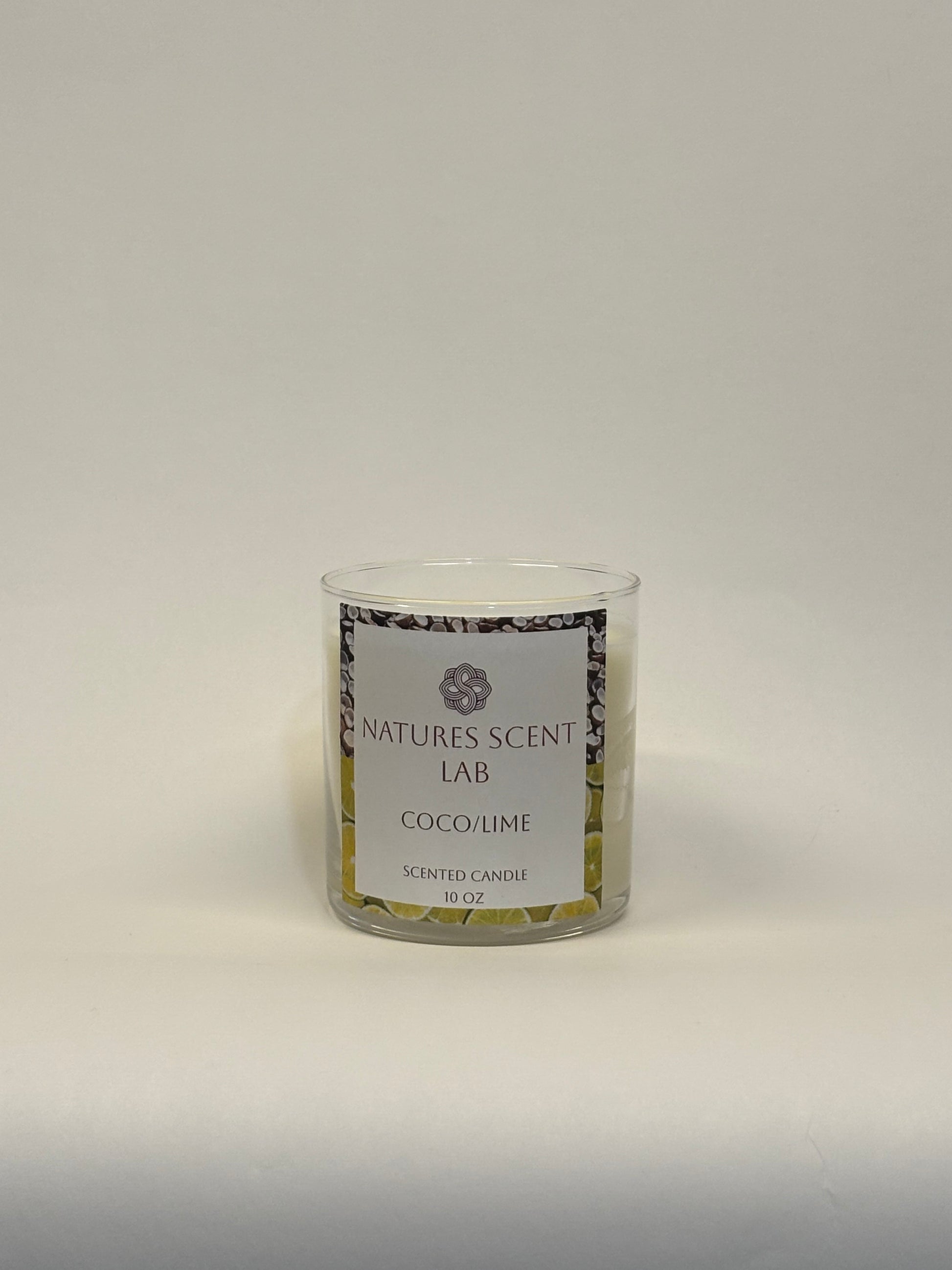 10oz coco/lime candle on a white background