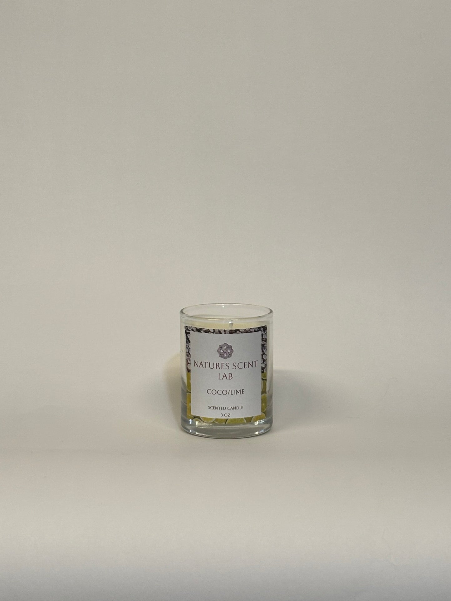 3oz coco/lime candle on a white background